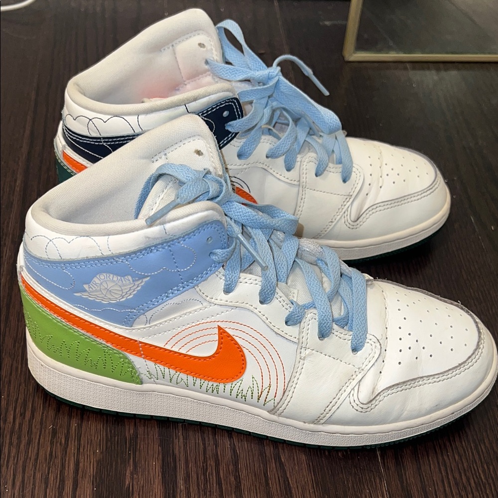Nike White and Blue Sneakers with Orange Swoosh